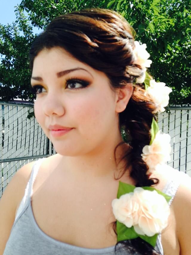 Soft romantic makeup and a beautiful side braid wi