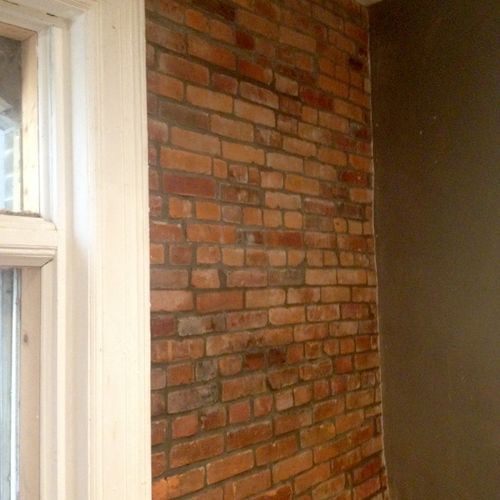 interior brick wall, after
