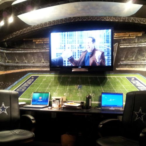 Home office of a Cowboy fan, he loves his Sky Box.