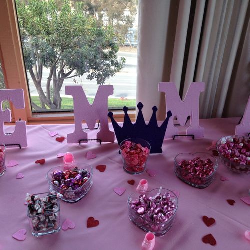 Candy table for a baby shower. The letters are cov