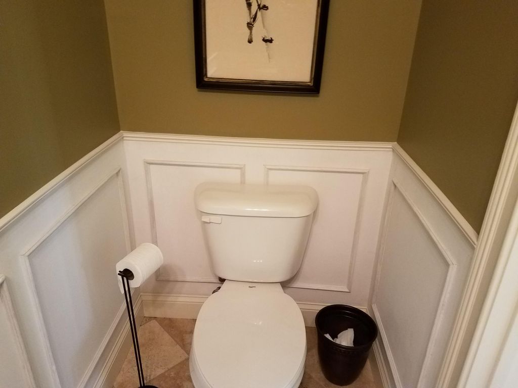 Wainscote in a small half bath in West Chester. Pi
