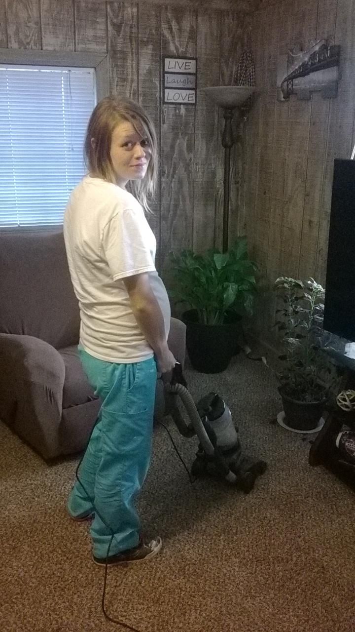 Amanda cleaning a weekly customers house.