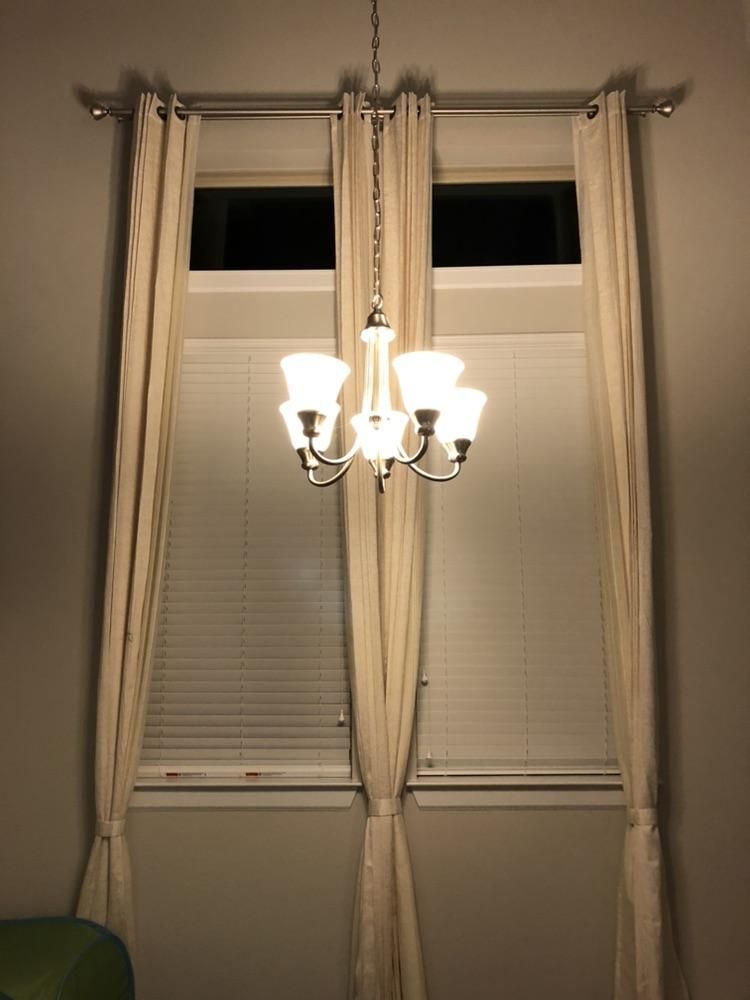 1 of 8 curtain rods and curtains installed for thi