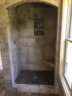 12x12 Porcelain shower with arch.