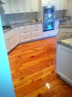 Reclaimed heart pine, installed & site-finished