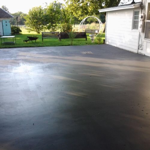 charcoal stained slick finished concrete