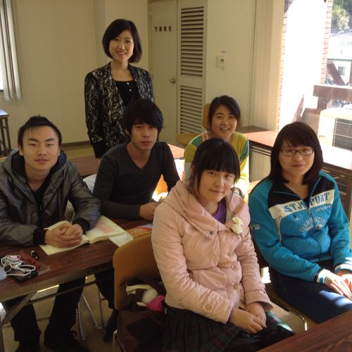 Teaching Japanese to Chinese trainees in Osaka.