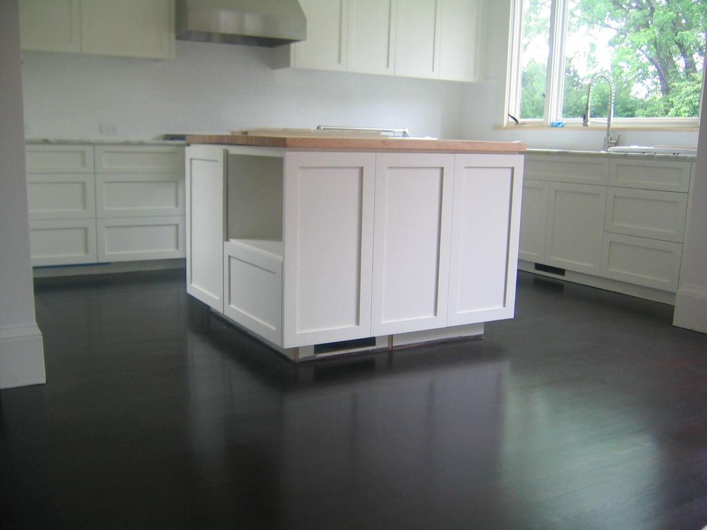 Installed, sanded and finished: dyed white oak in 