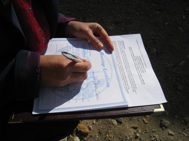Signing souvenir marriage certificate