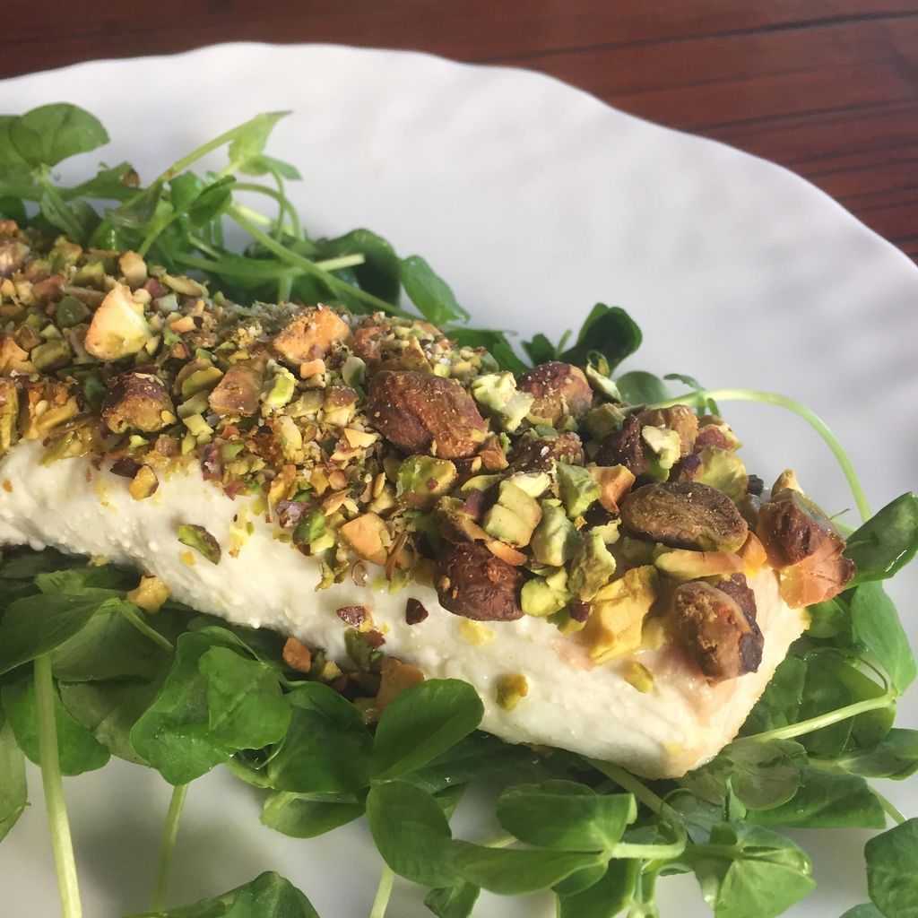 Pistachio-Crusted Halibut over Micro-Greens