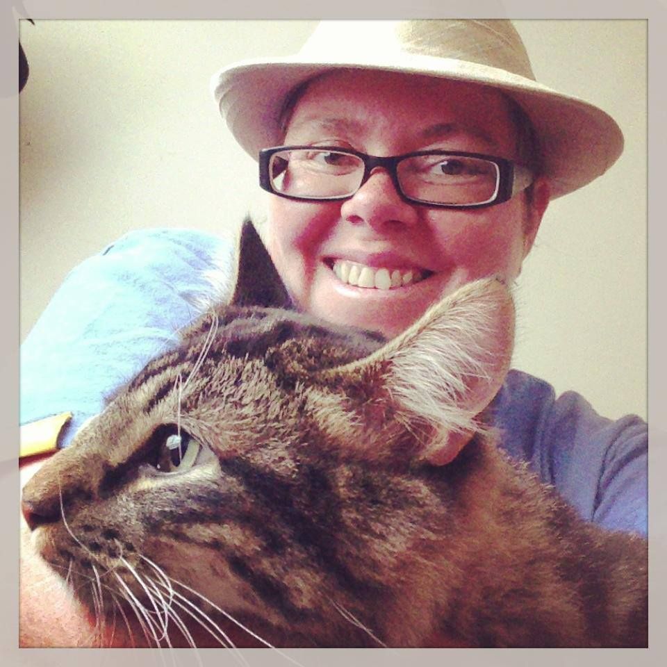 me and levi, the one-eyed maine coon cat. he's a r