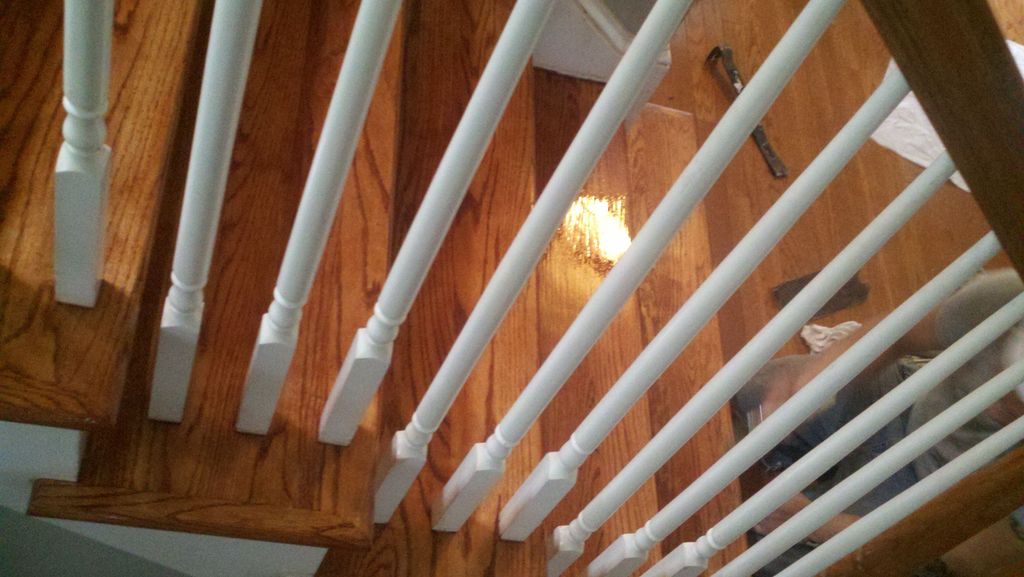 Sand, stain and finish staircase.