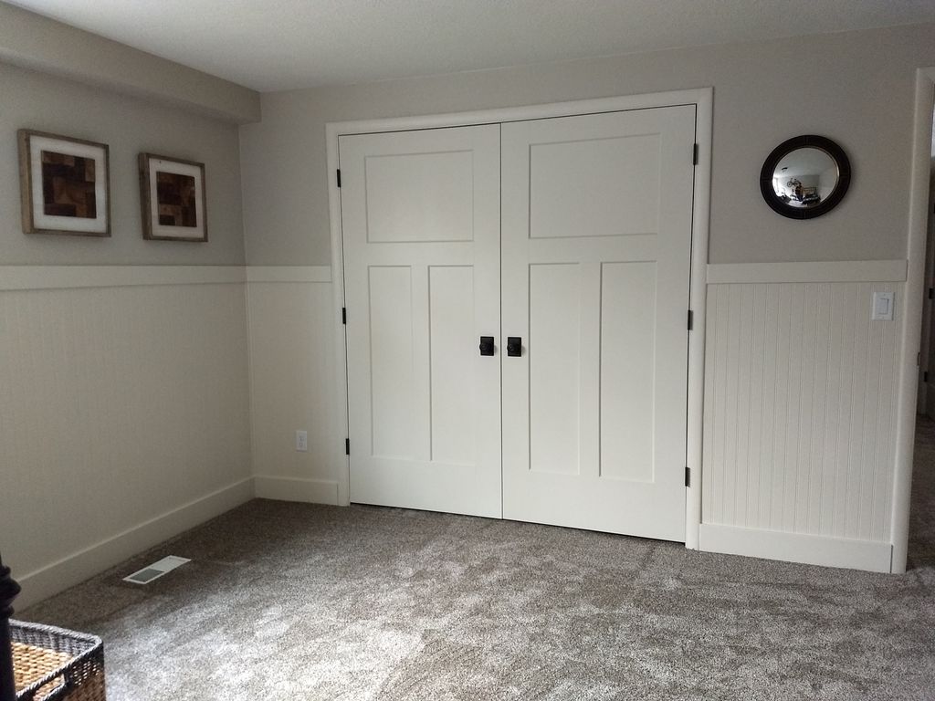Double hung closet doors installed and cased. Bead