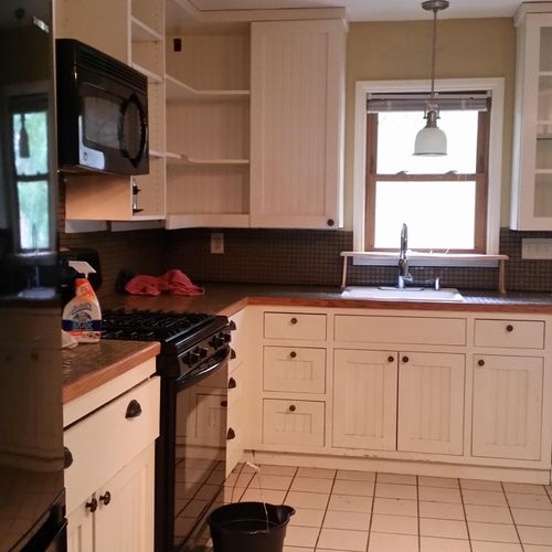 Installed kitchen cabinets with tile counter