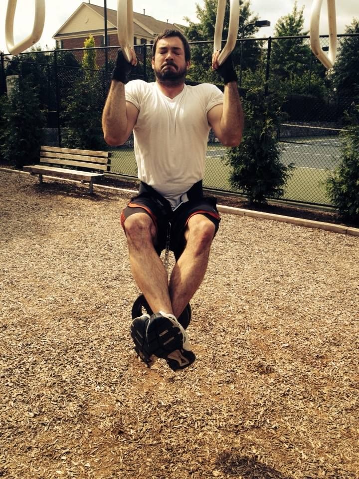 This is a Weighted Pull-Up.  If you want to build 