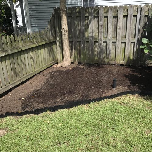 Removal of shrubs, level, grade, weed protection f