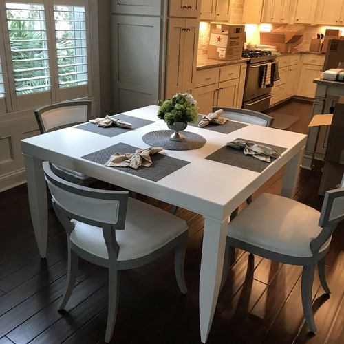 Custom breakfast table, chairs upholstered in a st