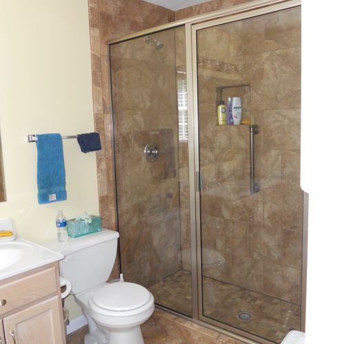 Replaced master tub with a walk-in tile shower, ne