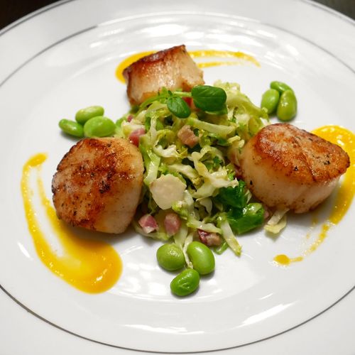 Scallops and a Fava Bean & Bacon Glazed Brussel Sp