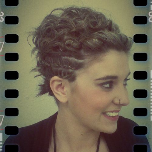 Edgy updo on short hair with cornrows.