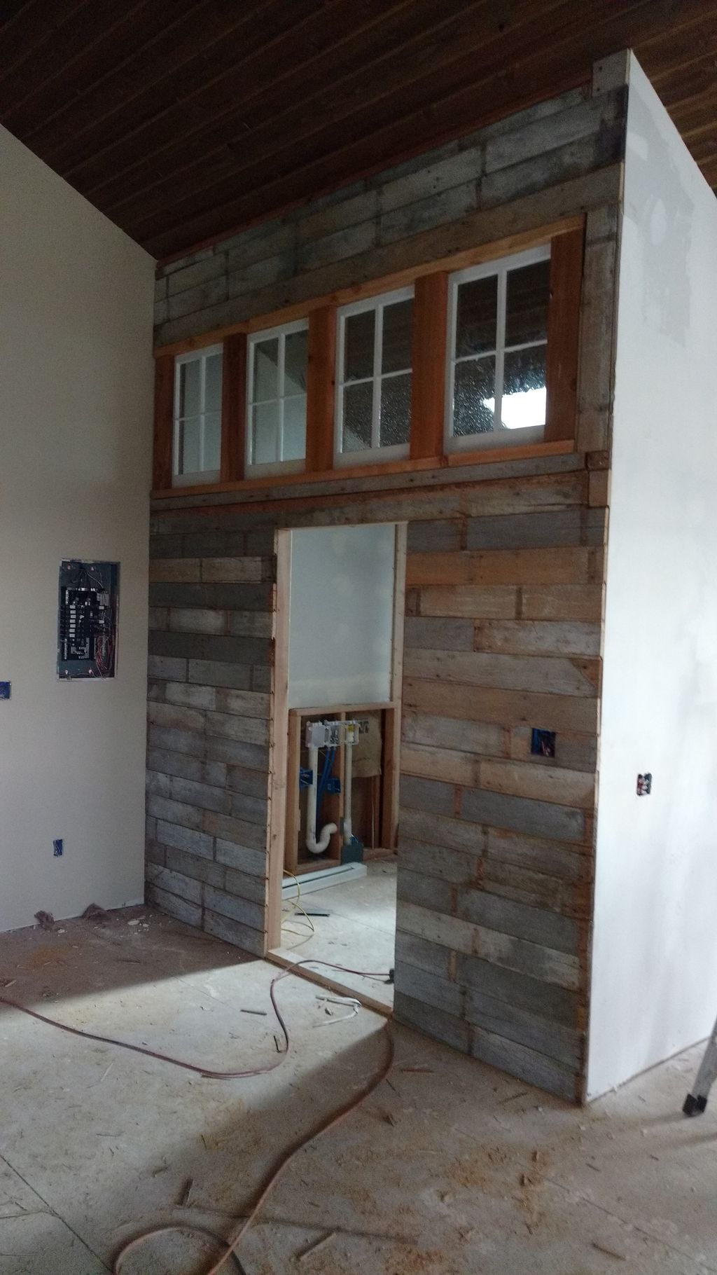 salvaged barnwood and reglassed barn windows as de