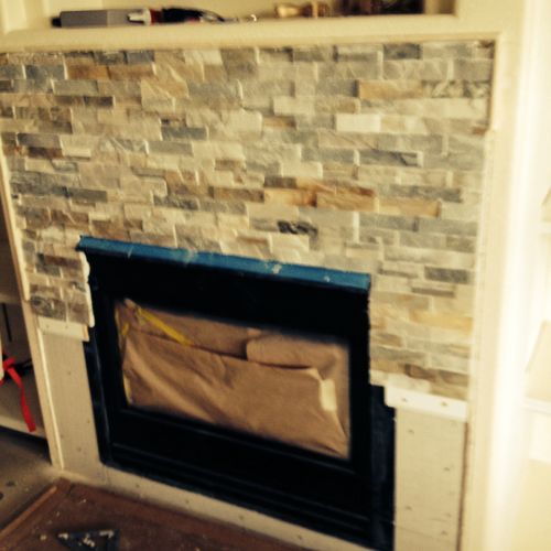 Installed the stone around fireplace