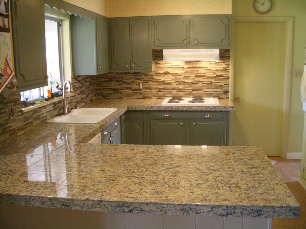 Kitchen remodel job in Cambridge. Custom tile. Bac
