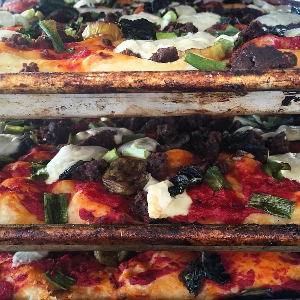 Sicilian style pizzas right out of the oven.