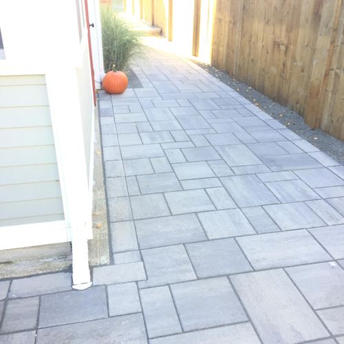 Paver walkway connecting to paver driveway