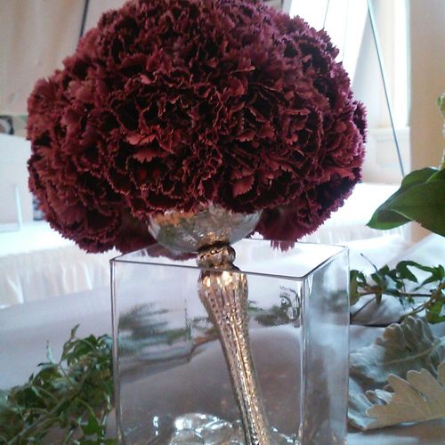 Carnation bouquet in elegant silver bouquet holder