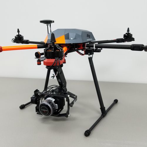 Medium drone with black magic micro cinema camera.
