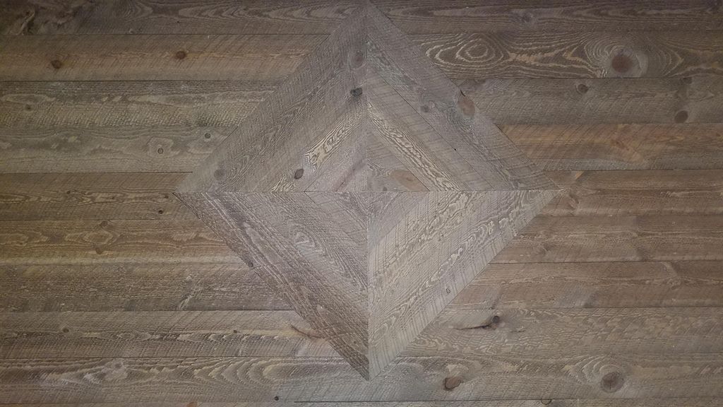 Reclaimed wood pattern accent wall design.