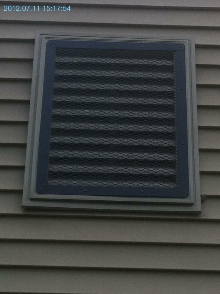 Installed stainless steel gable vent cover to prev
