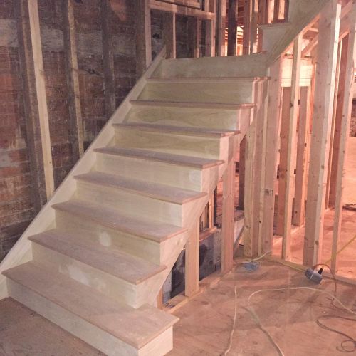 Custom Poplar/Oak tread Main stair case
