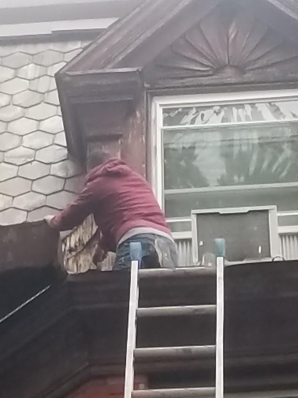 Brown stone building ROOF REPAIRS 