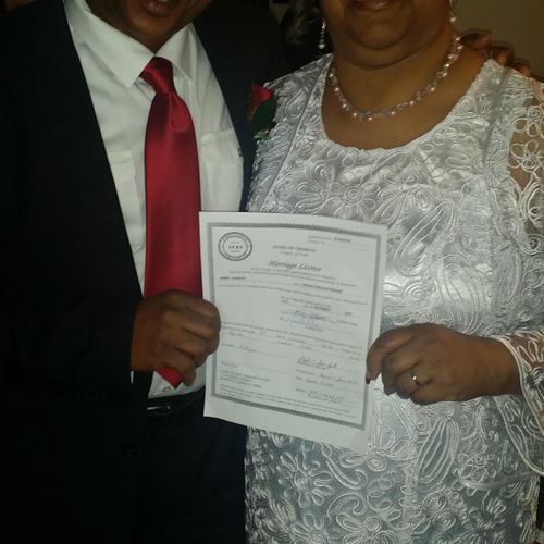 Newlyweds and their Marriage Certificate