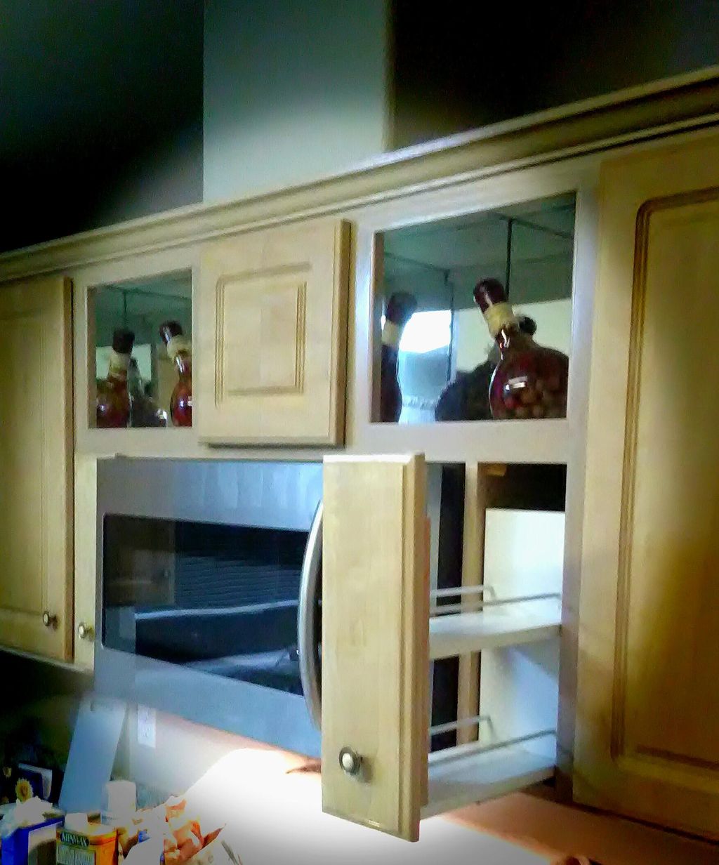 shrunk the upper cabinet to make microwave flush a