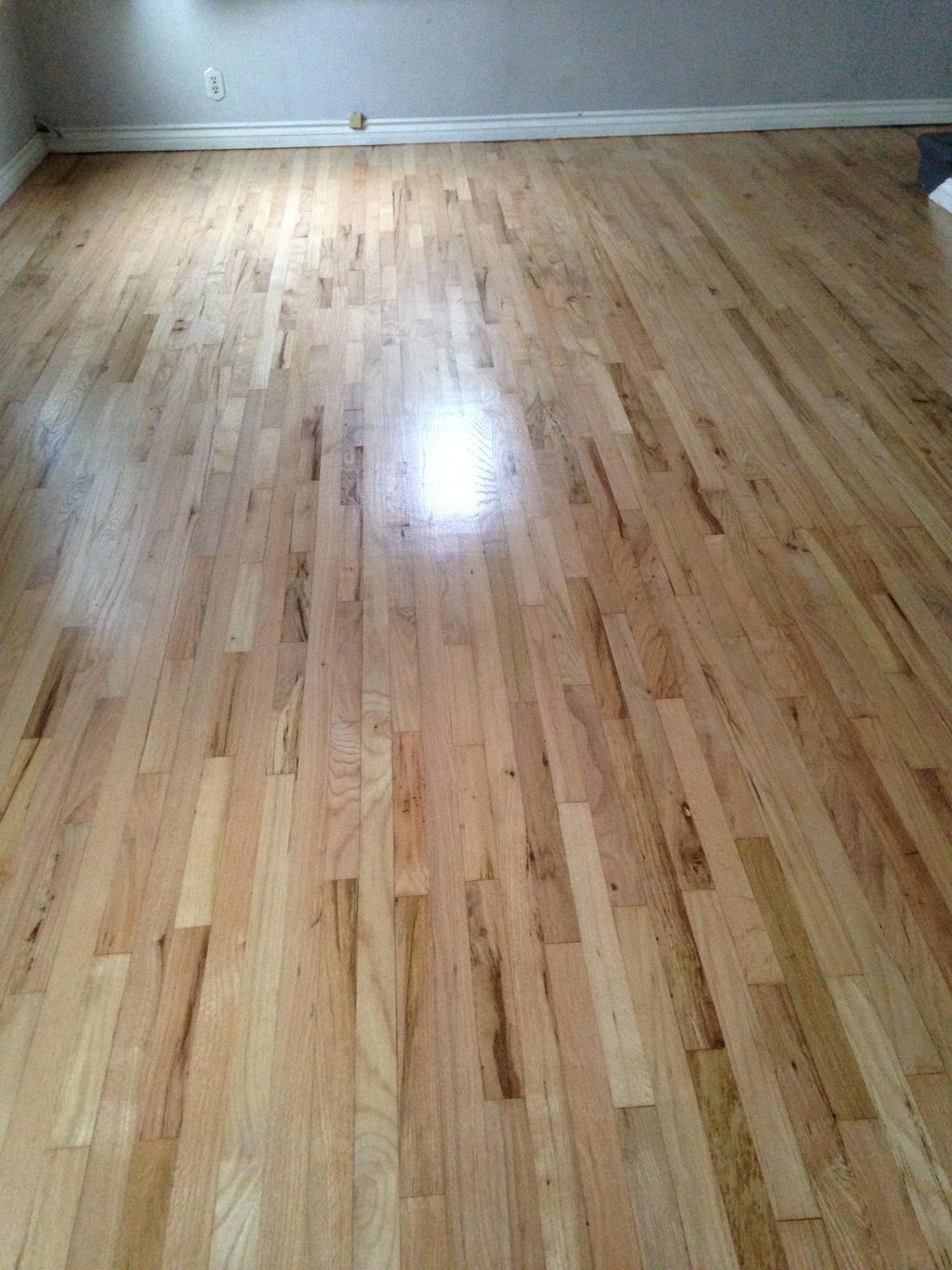 Refinished flooring with two coats