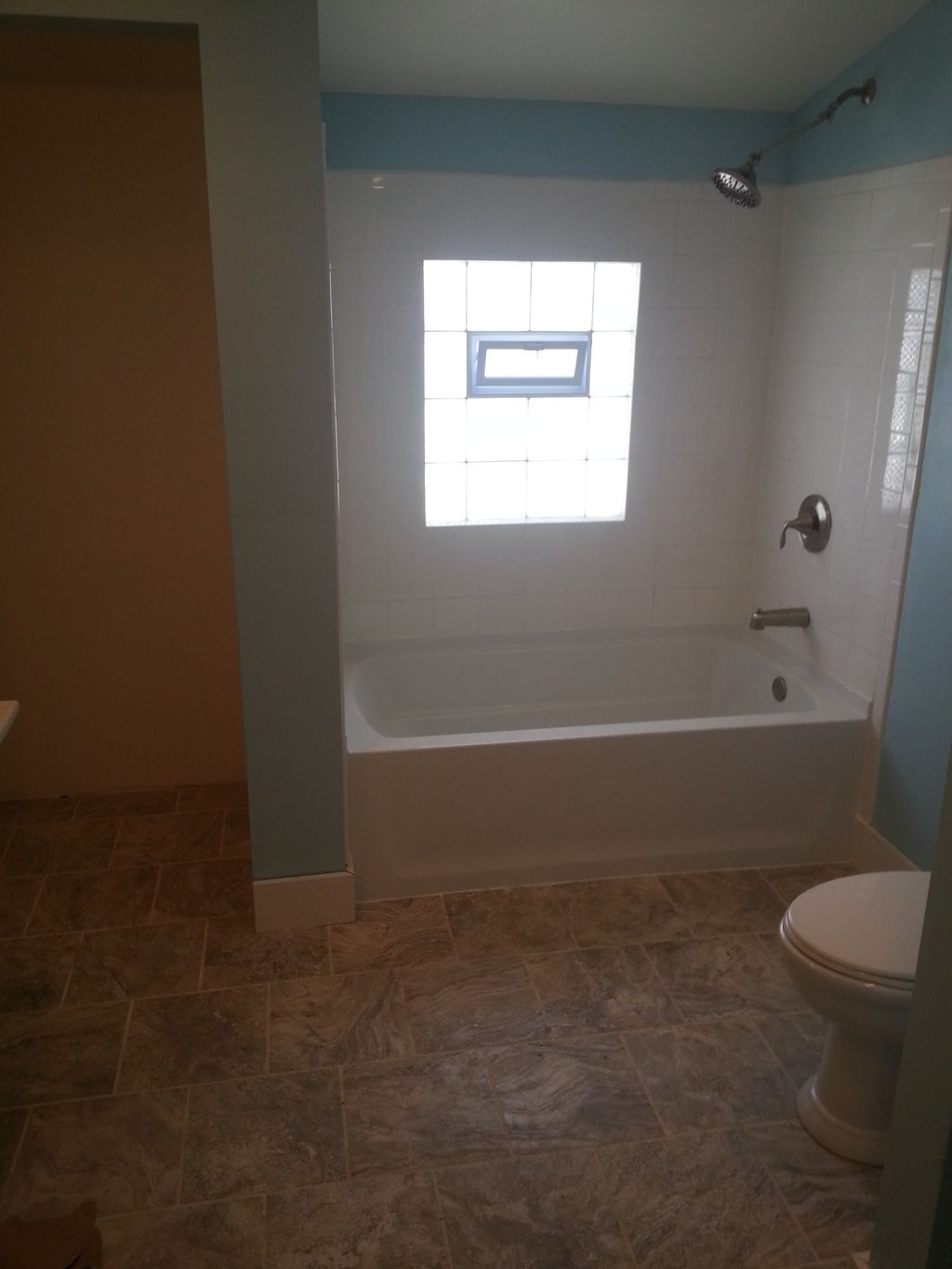 Tile surround with tile brickset floor