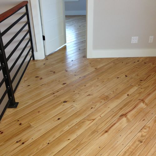 Natural pine hardwood floors.