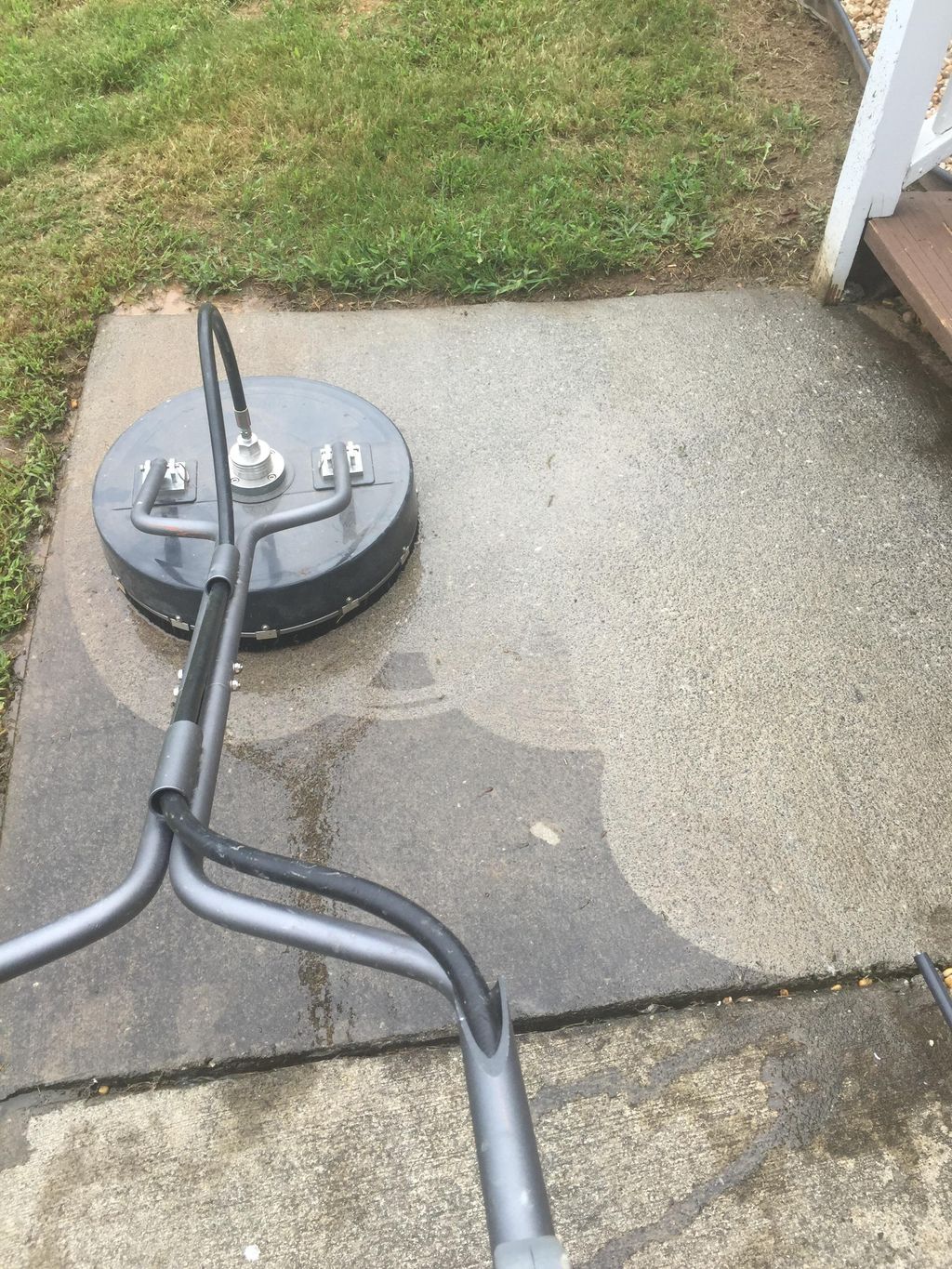 Pressure washing concrete. 