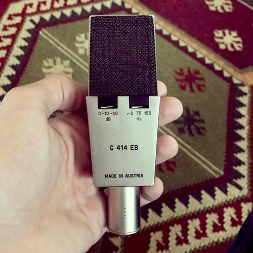 One of two Vintage AKH C414 EB condenser microphon
