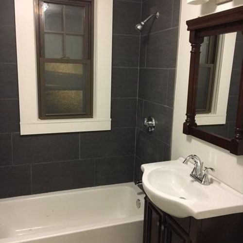 A remodeled bathroom provided by our maintenance t