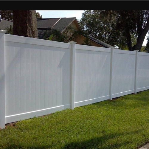 Replaced wooden fence with vinyl fencing.