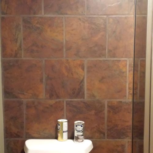 #1 Tiled bathroom wall renovation.