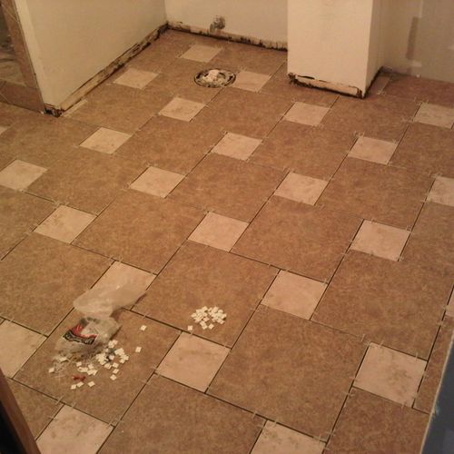Decorative bathroom/laundryroom tile job.