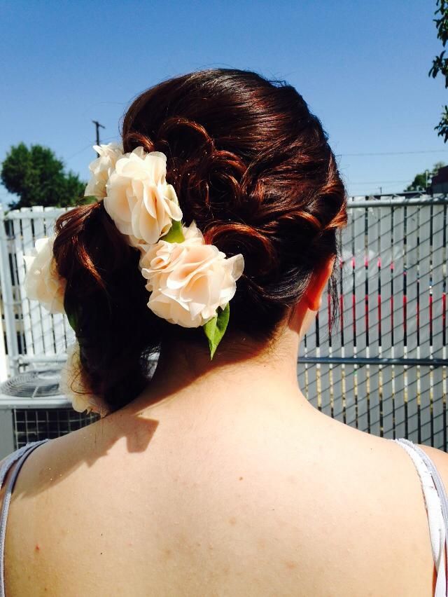 Beautiful side braid with curls.