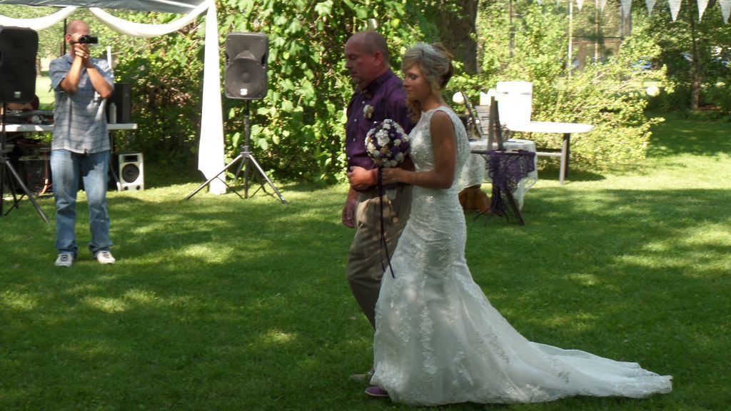 Here comes the Bride wit a very tearful Dad...