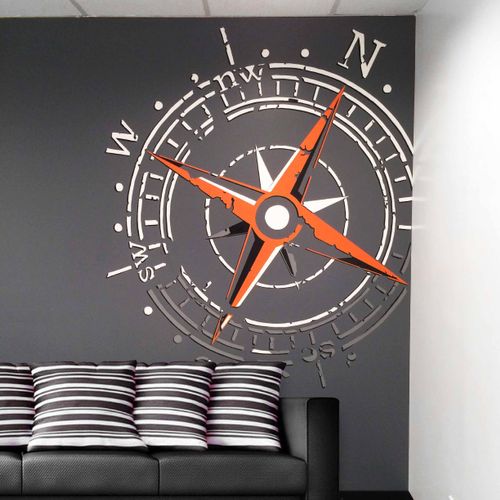 Compass wall mural painted by Manrique Mural Art a