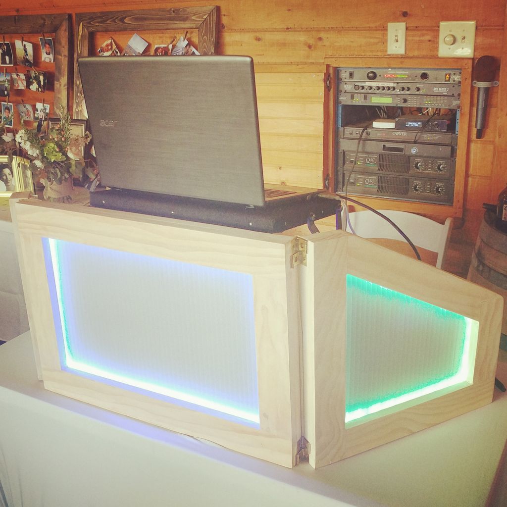 closeup of base wedding dj setup gear on wall was 